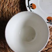 A large cup of chocolate tea, saucer Badonviller Barcarolle orange black.