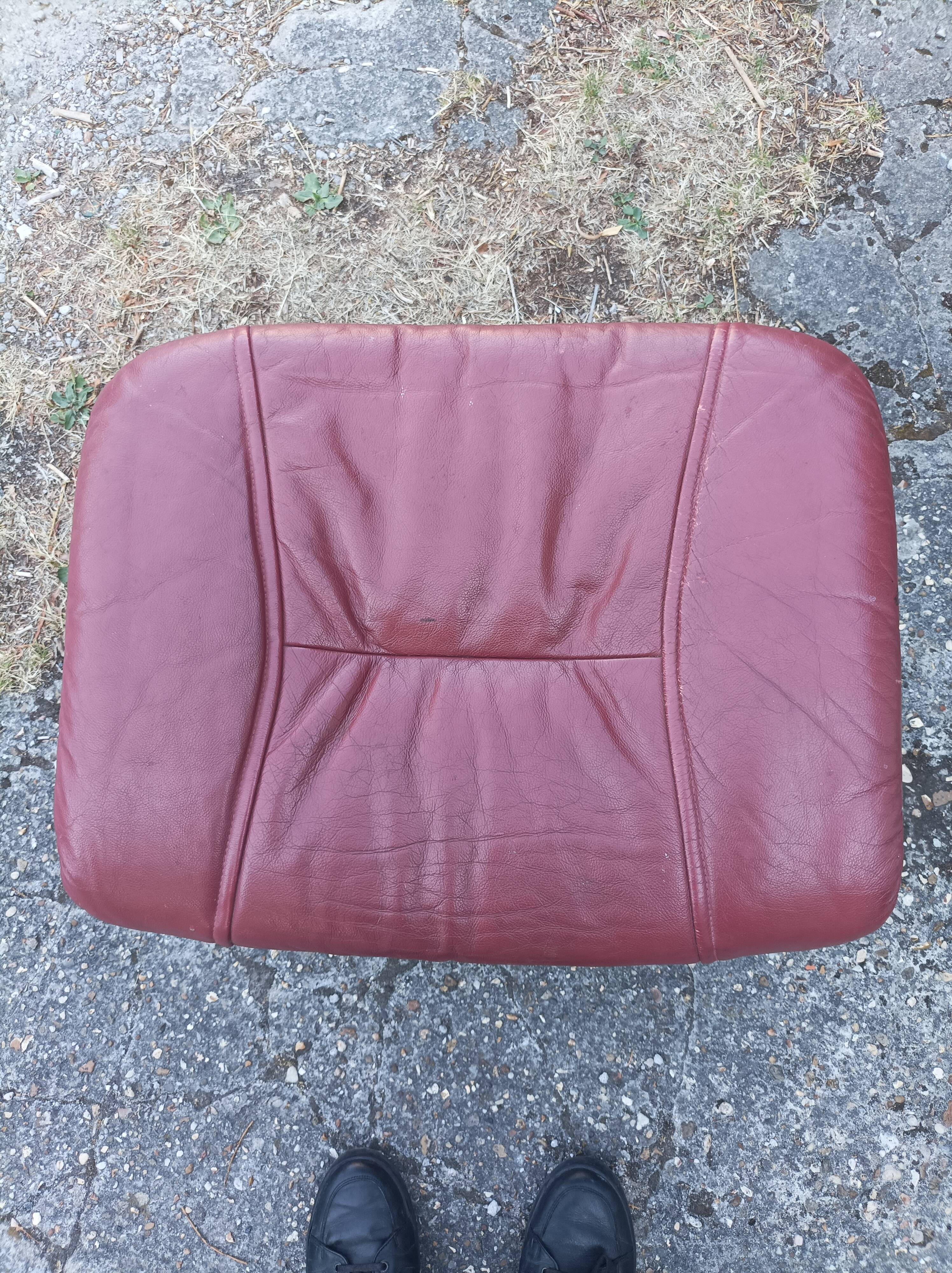 Old armchair on vintage leather foot + foot rest