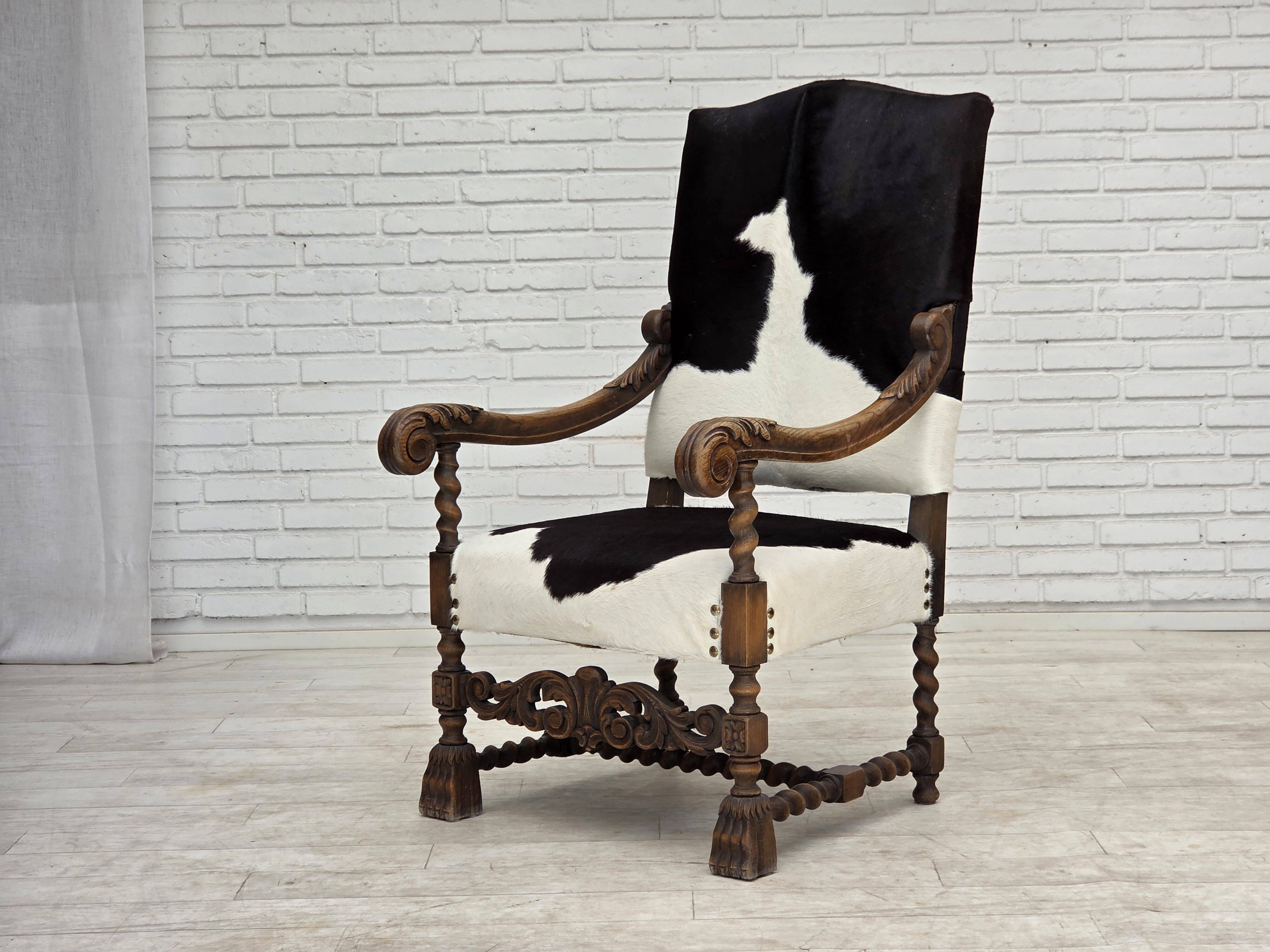 1950s, Danish highback armchair, genuine cowhide, oak wood.