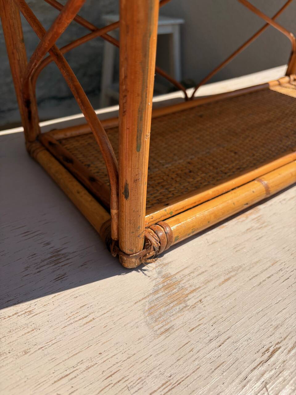 Vintage wall shelf in rattan