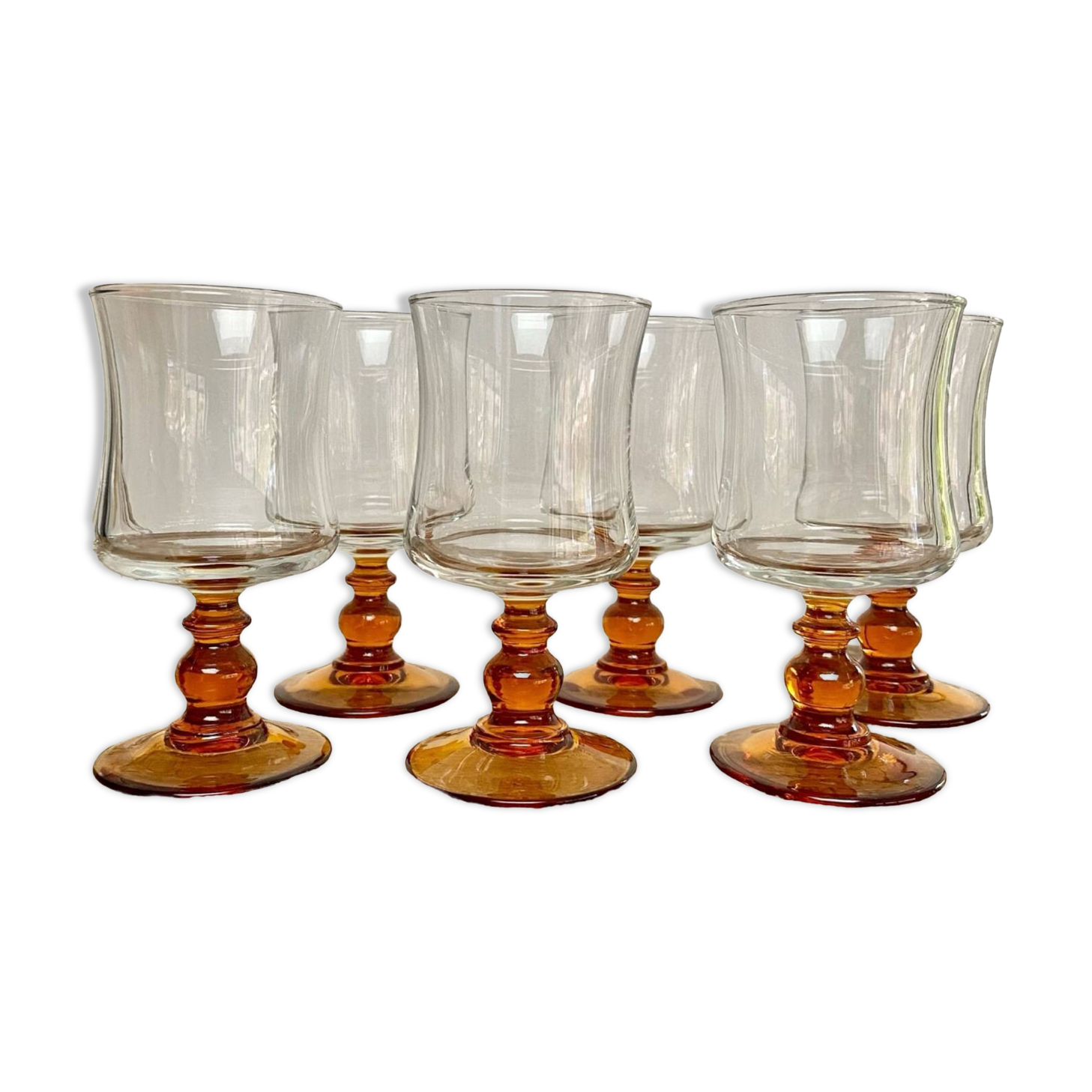 6 small amber stemmed glasses