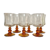 6 small amber stemmed glasses