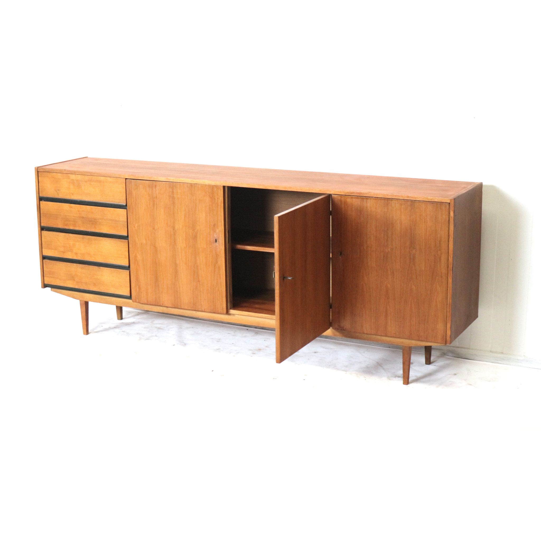 Large vintage sideboard with drawers and doors made in the 60s