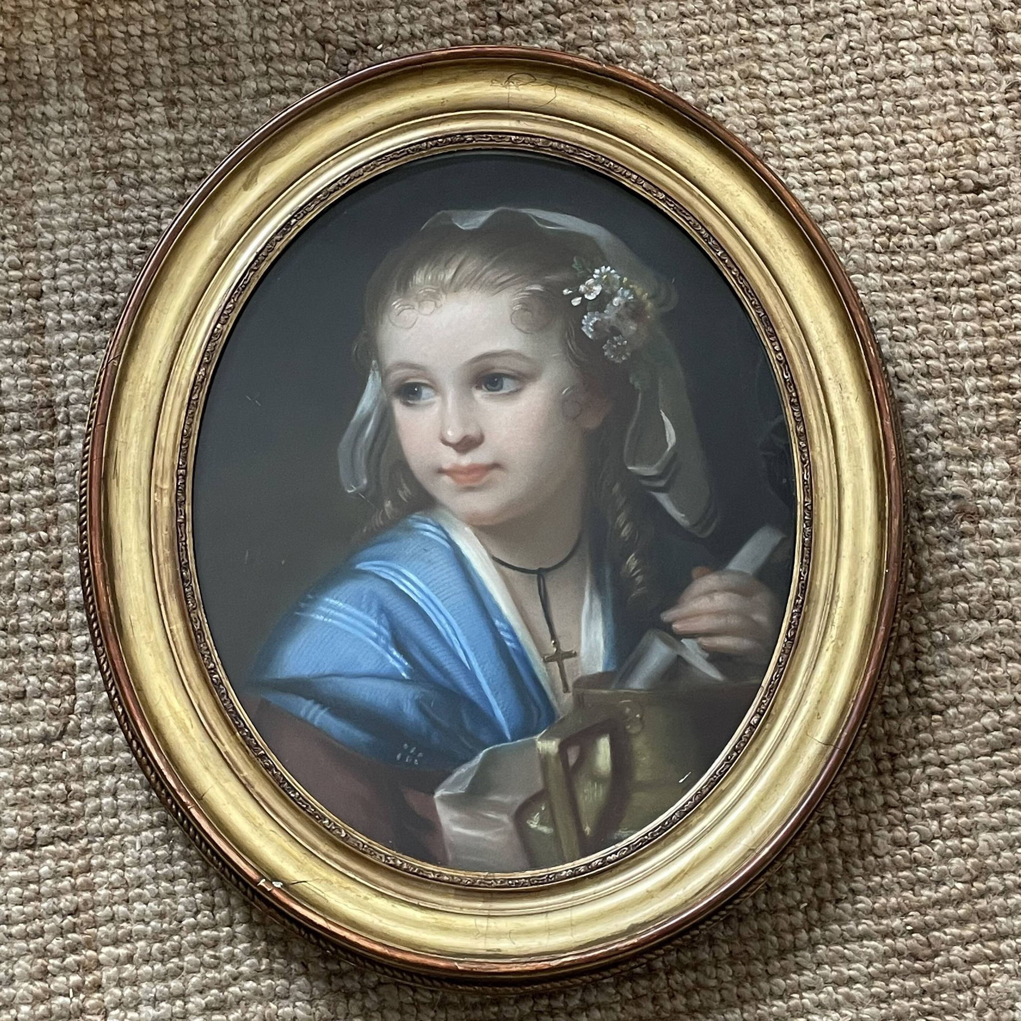 Portrait of a young girl in pastel from the 19th century.