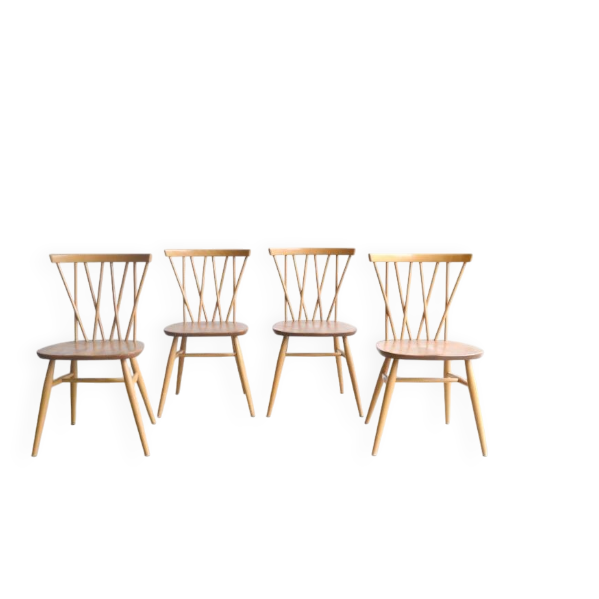 Series of four “candlestick” chairs by Lucian Ercolani