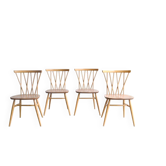 Series of four “candlestick” chairs by Lucian Ercolani