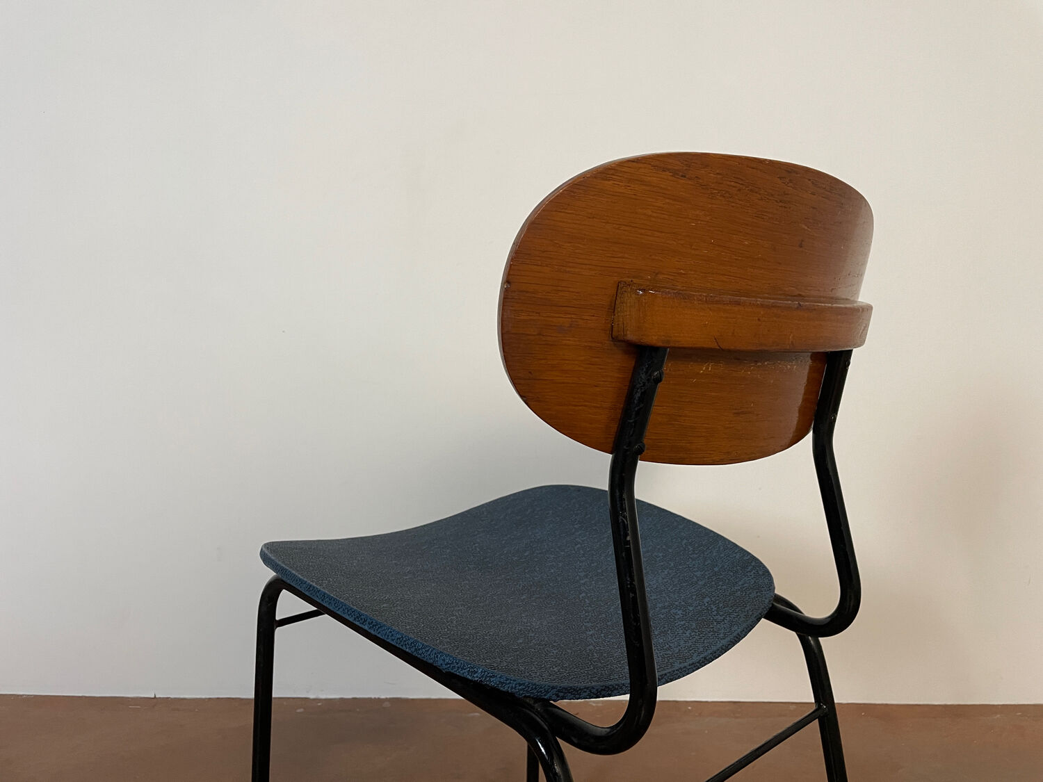 Wooden chairs and skaï