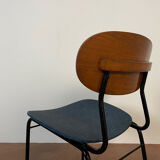 Wooden chairs and skaï