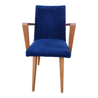 Old wooden armchair and velvet blue feet vintage compass