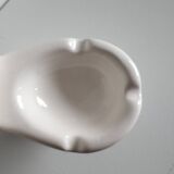 Atypical ashtray in the shape of a toilet