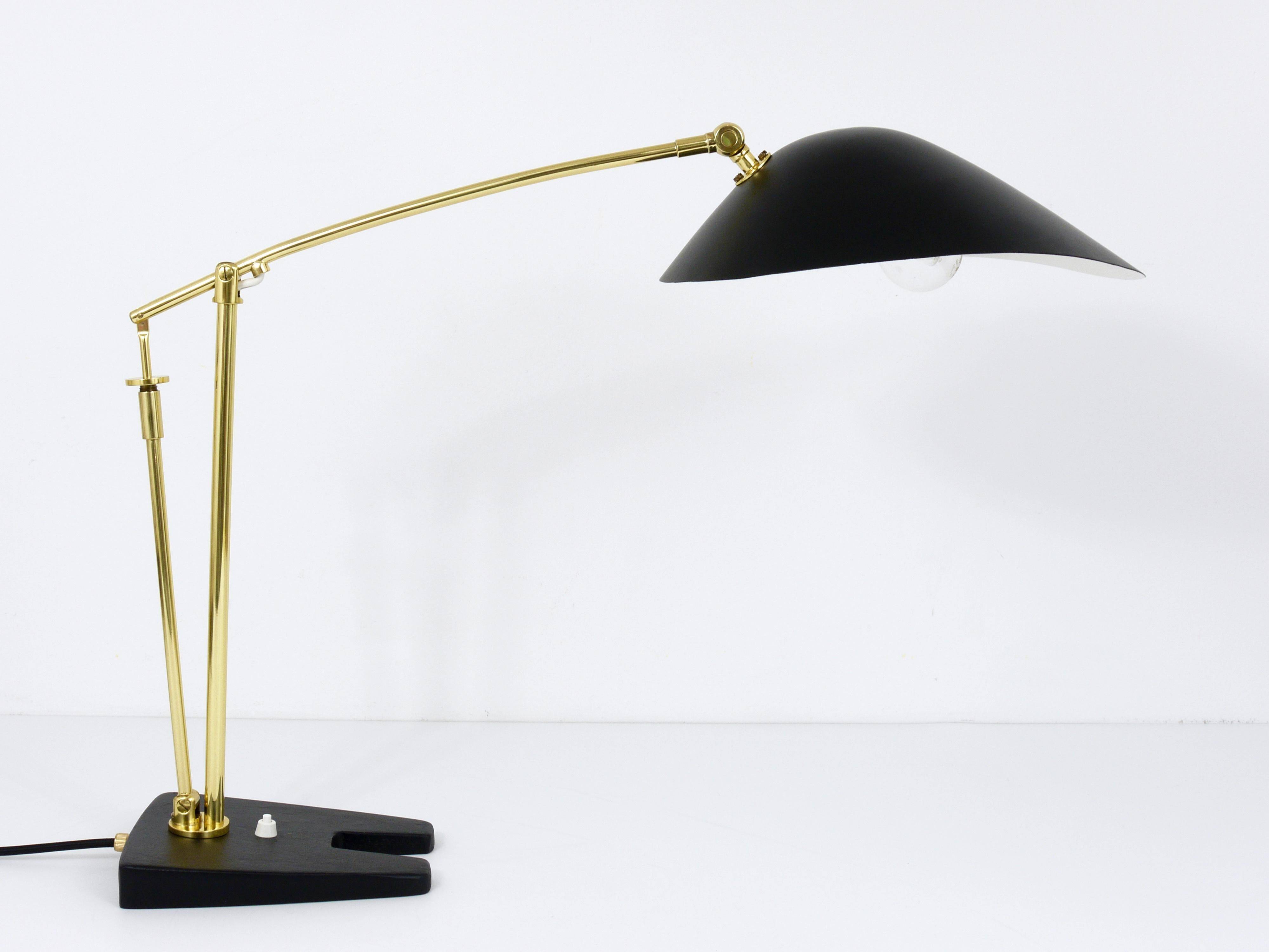 Articulated brass desk lamp in the style of Angelo Lelli, mid-century, Italy, 1950s.