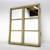 Vintage wooden window converted to a mirror