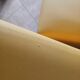 Set of 4 vintage 70s/80s armchairs in mustard yellow faux leather.