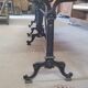 Large bistro table with a wooden top and cast iron legs - 2m56