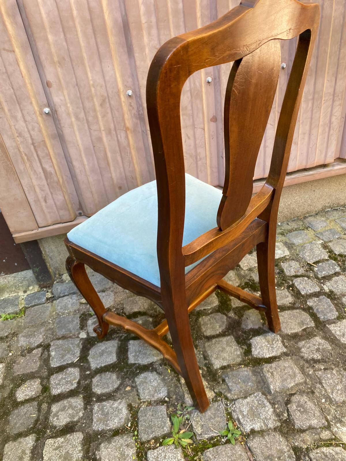 Vintage Louis XV chair made of carved solid wood with blue velvet fabric.