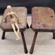 Pair of solid octagon cowhide tripod stools