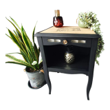 Black bedside table and raw wood