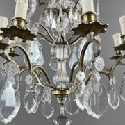Bronze, brass and crystal chandelier, early 20th century.
