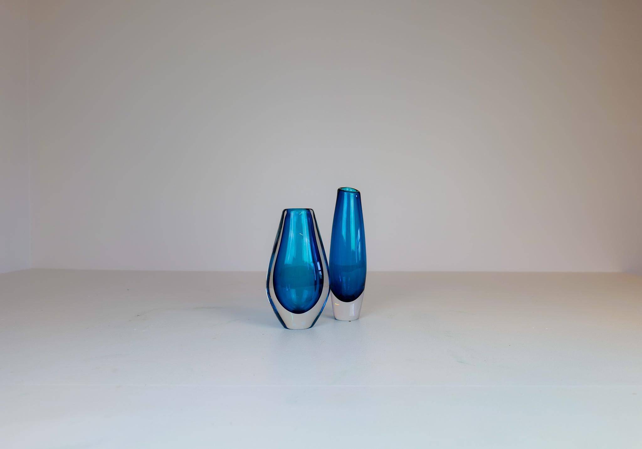 Pair of heavy crystal vases by Orrefors Mid-Century Modern by Sven Palmqvist, light blue.