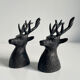 Salt and pepper shaker set with patinated brass deer heads.