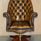 Fauteuil Chesterfield directeur ou capitaine Art Déco en cuir restauré