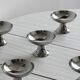 6 silver-plated metal bowls.