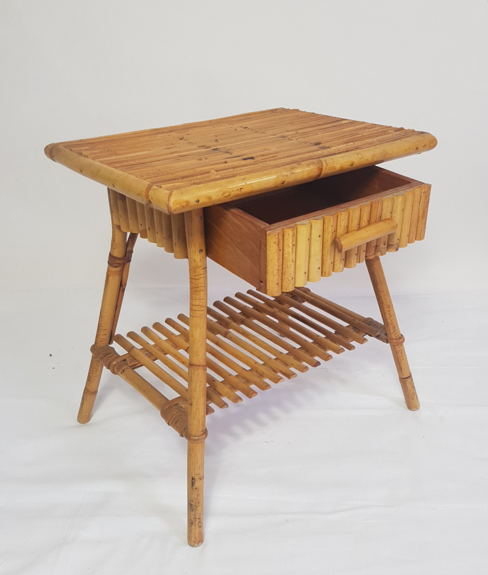 Rattan bedside awarded to Louis Sognot 1950