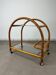 Glass and rattan dessert trolley, bar cart