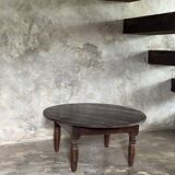Coffee table, round antique Indonesian teak table with straight legs.
