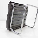 Ensemble fauteuil lounge et repose-pieds en cuir tubulaire chromé - années 1950