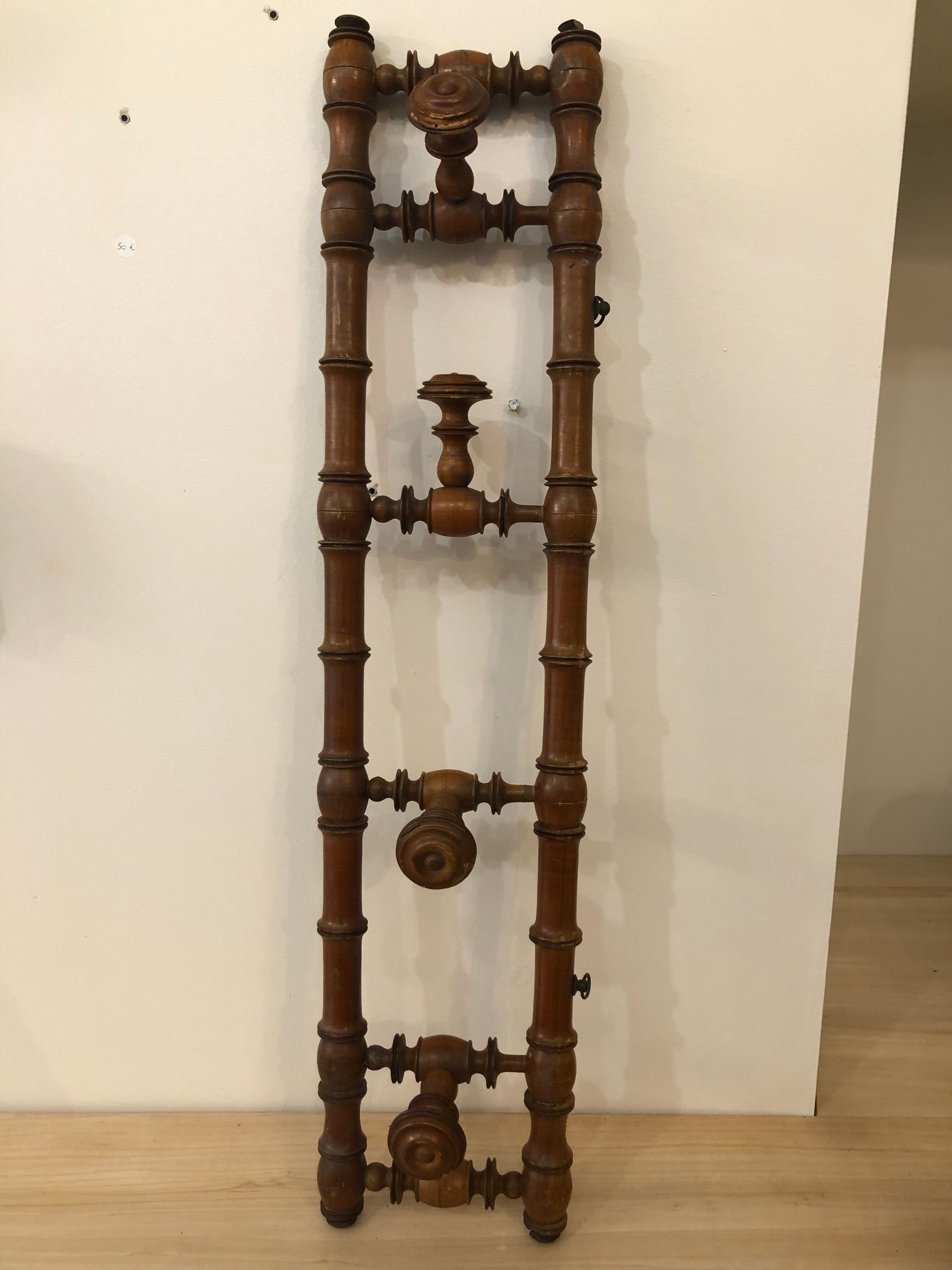 Wooden coat rack with swivel hooks