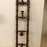 Wooden coat rack with swivel hooks
