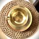 Cup and saucer in brass Saint Médard (18th century)