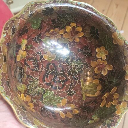 Vintage Asian brass bowl with floral decoration.