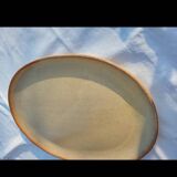 Oval dish in speckled enamelled stoneware