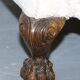 Victorian suite in damask, walnut frame, legs carved in lion's paw.