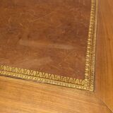 Cherry wood desk with a leather top.