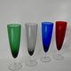 Set of 4 designer champagne flutes in colored glass from the 70s