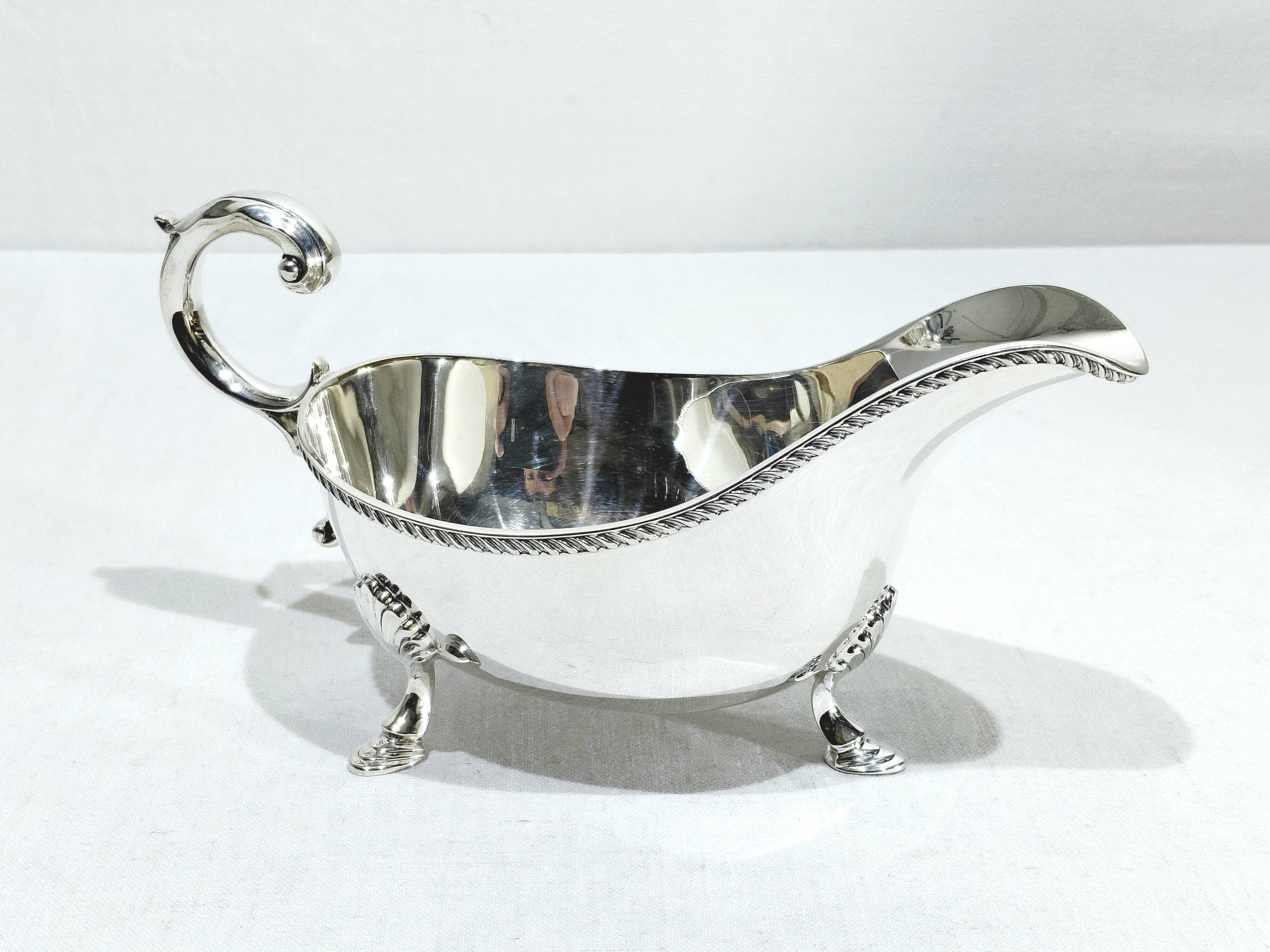 Silver sauceboat, England
