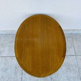 Oval teak coffee table