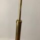1950 floor lamp rises downwards in diabolo brass