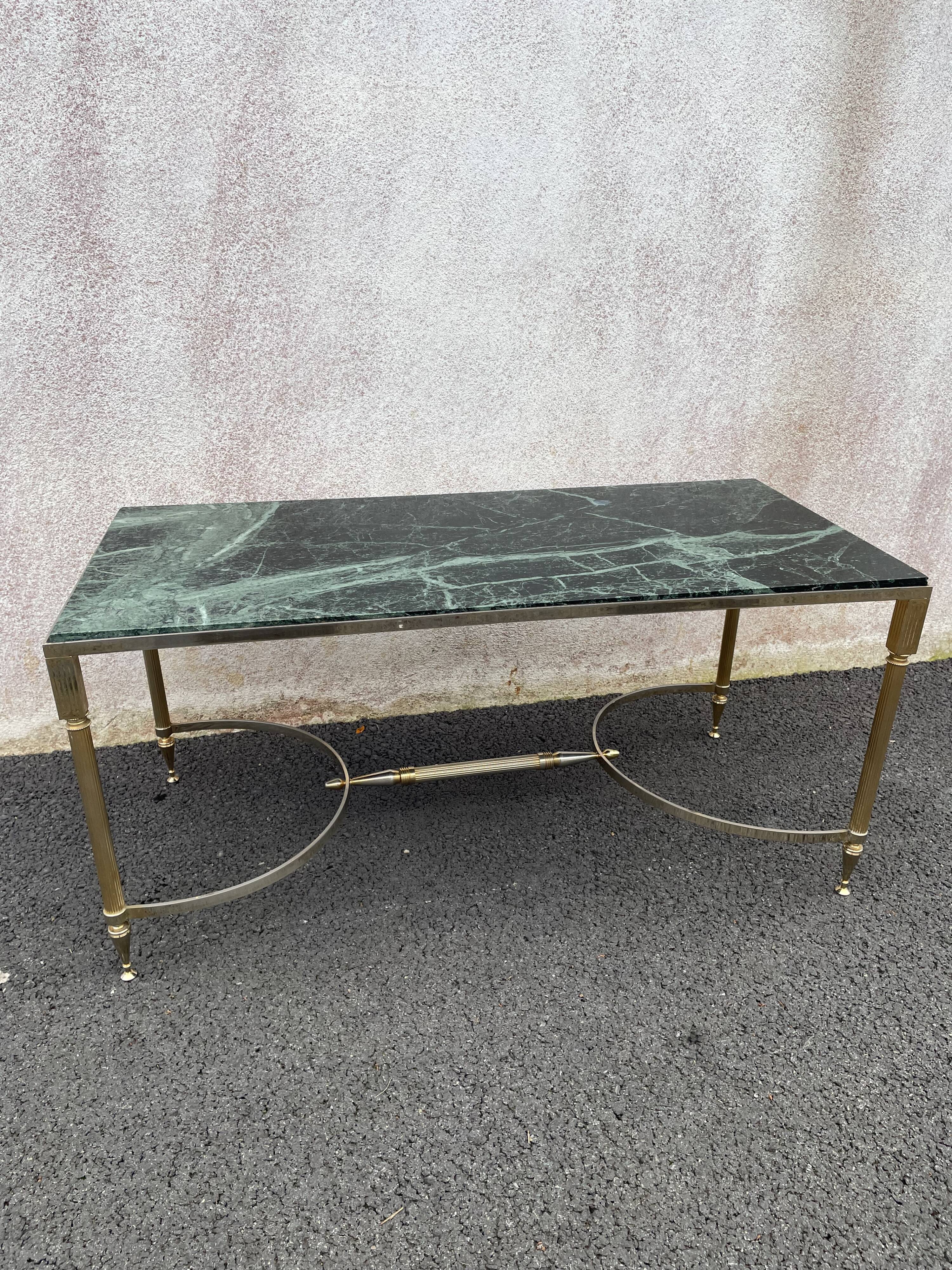 Coffee table in gilded brass and veined green marble