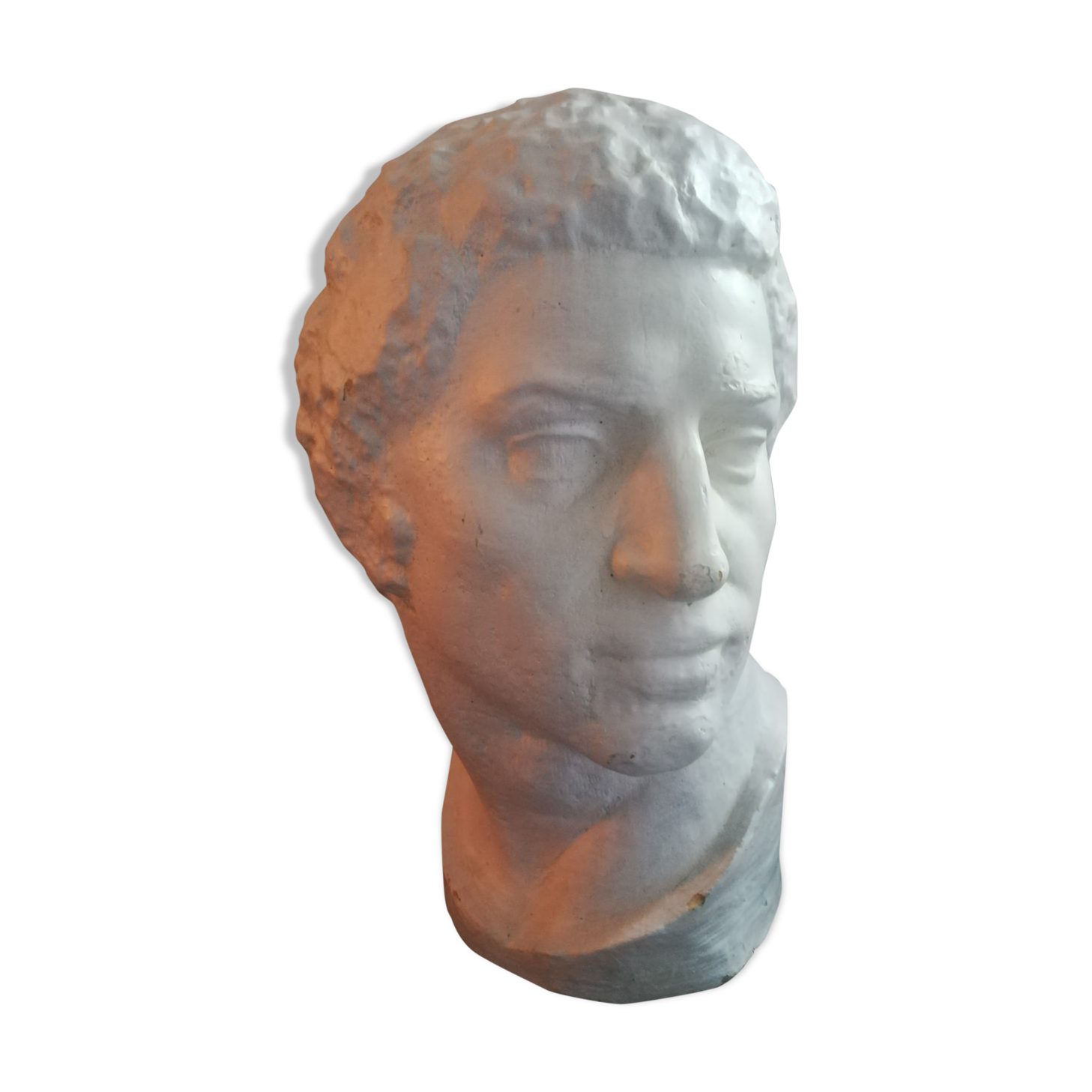 Patinated plaster man head.