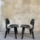 Pair of DCW chairs by Charles & Ray Eames in Black for Herman Miller 1950