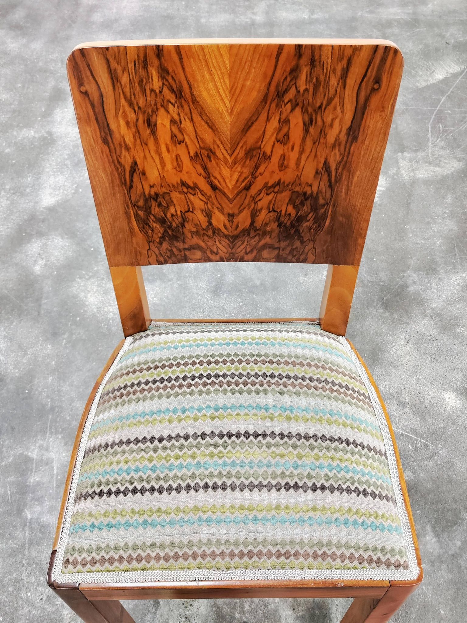 Set of six Art Deco dining chairs in walnut root veneer, 1940s.