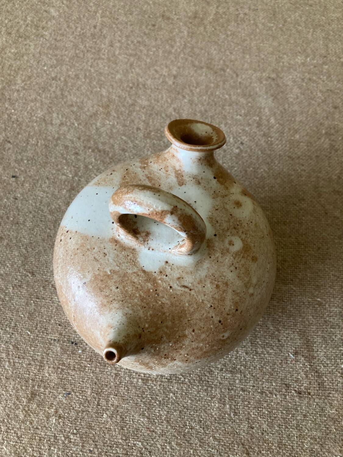 Small sandstone goat in the style of marsh sandstone or hot air balloon