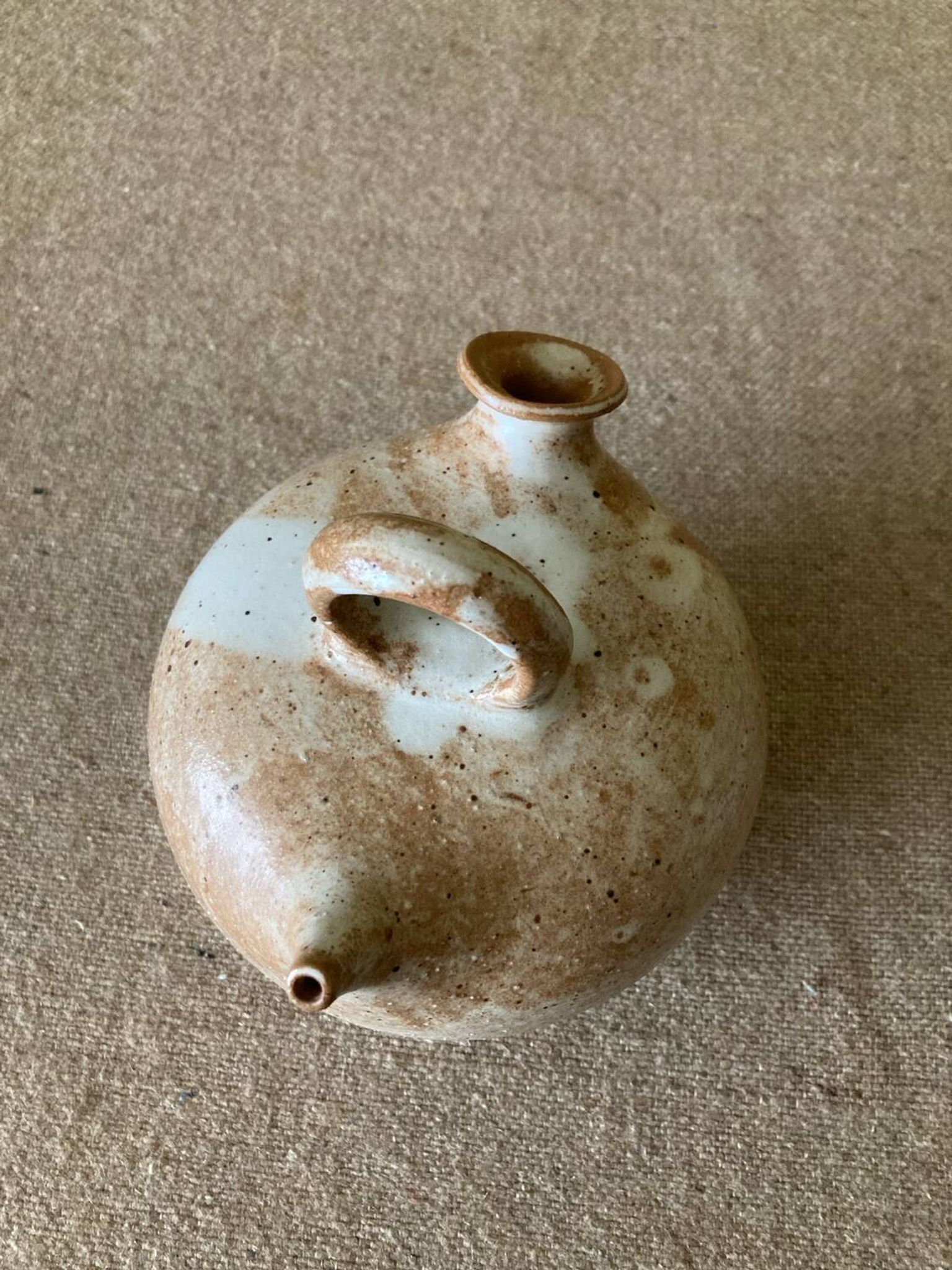 Small sandstone goat in the style of marsh sandstone or hot air balloon