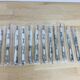Christofle, 12 Vendôme model dessert knives, silver-plated metal