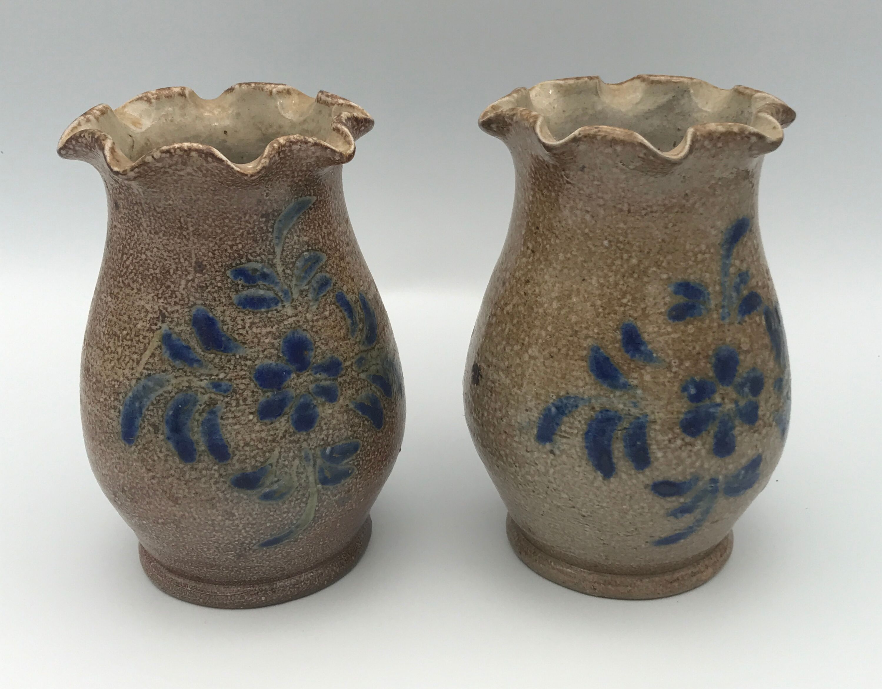 Pair of vintage pottery vases with floral decoration and glaçureau sel