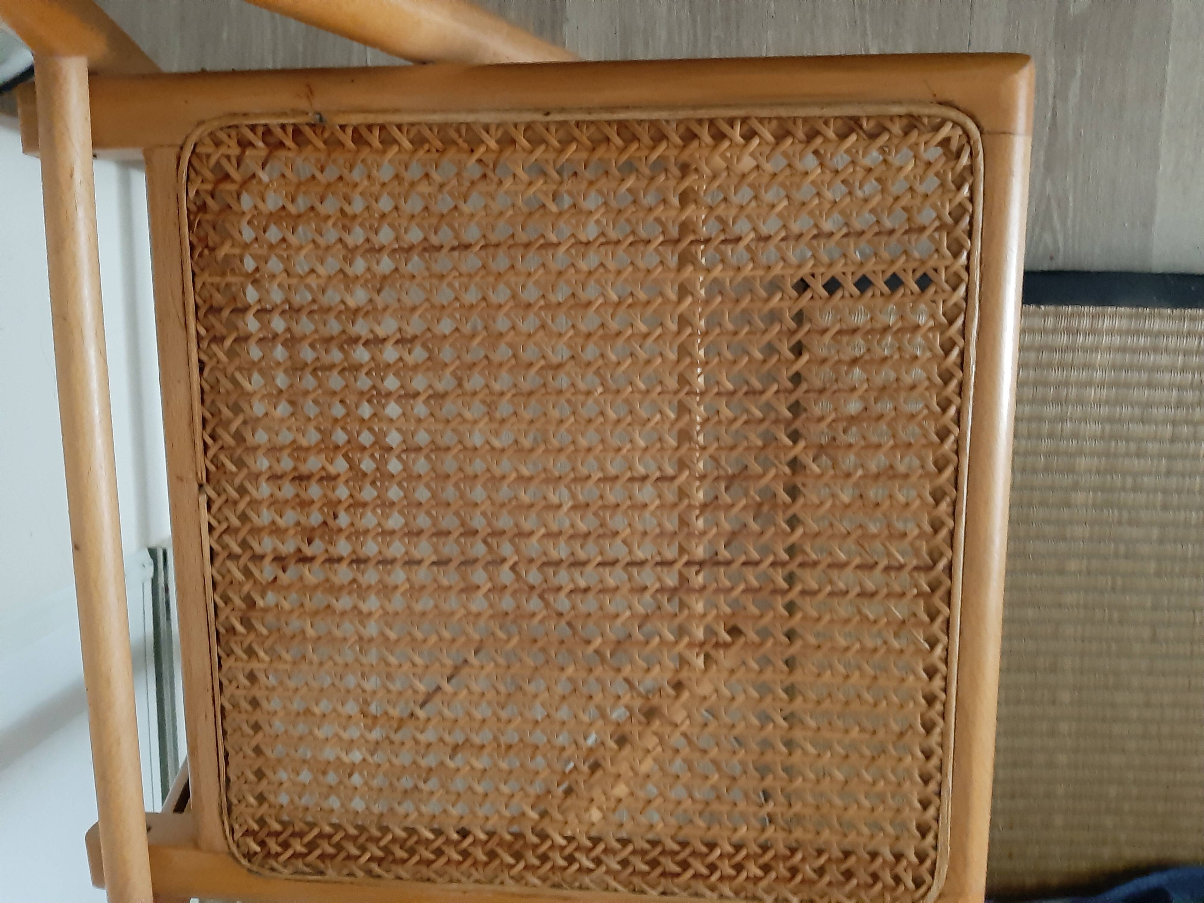 Folding chair in cannage